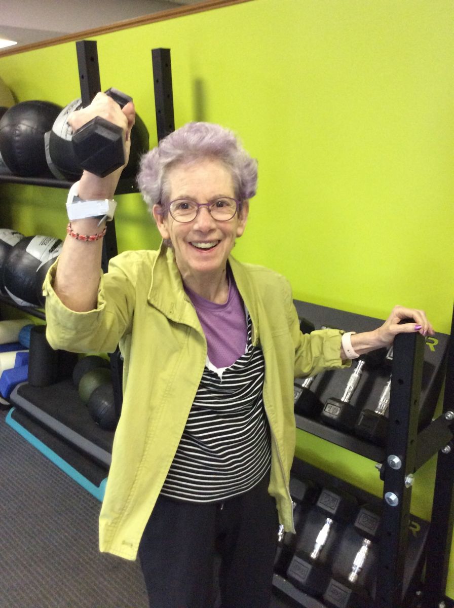 Miriam holding a dumbbell
